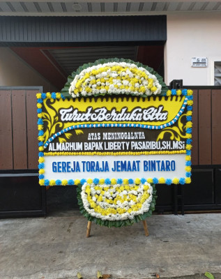 Papan Bunga Duka di Binawidya